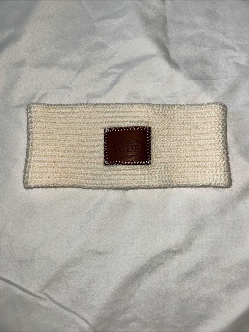 Love Your Melon Cream Knit Headband With Brown Leather Patch